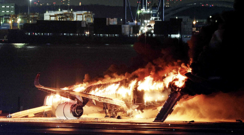 Japan plane catches fire