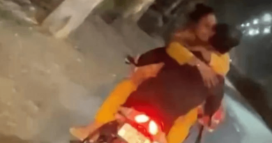 couple kissing on bike riding goes viral
