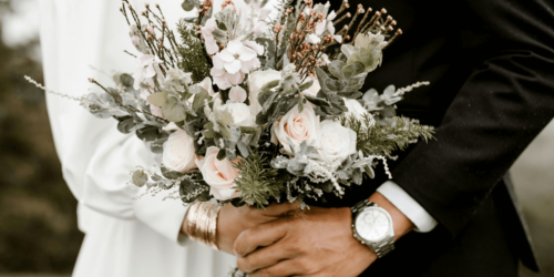 family members arrange wedding for deceased couple