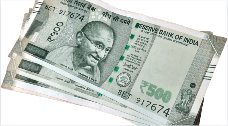 why mahatma gandhi keeps laughing on our currency