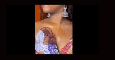 woman gets murugan painting on her breast