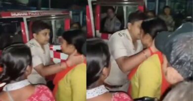 woman police kisses minor