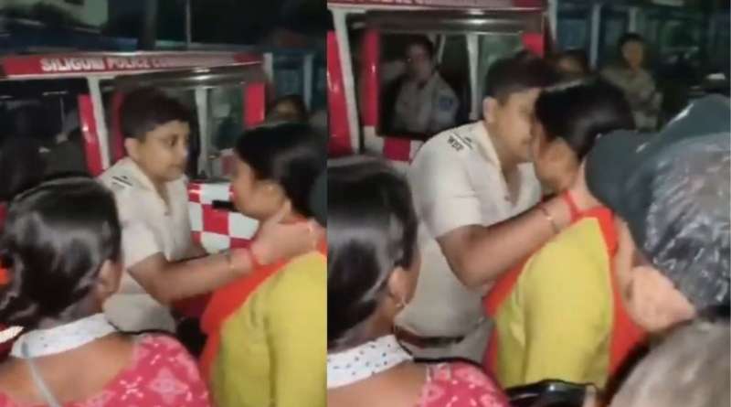 woman police kisses minor